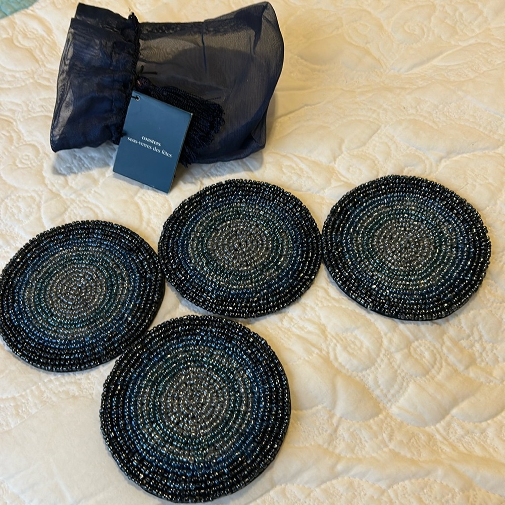 coasters, pretty blue beaded set of 4. With storage bag.